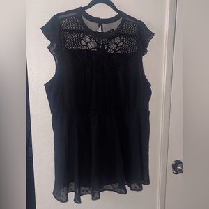 New black baby-doll style. Has sheer and crotchet details